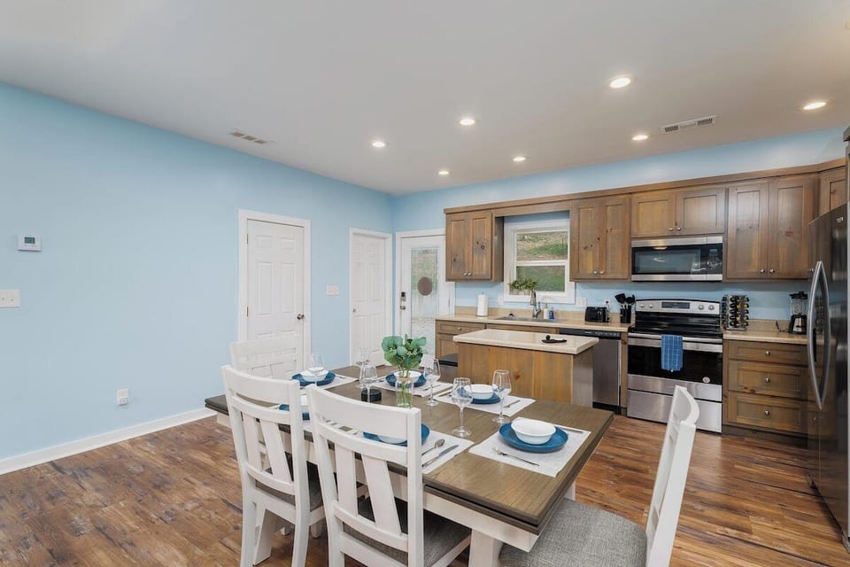 Fully stocked kitchen with kid-friendly utensils and plates