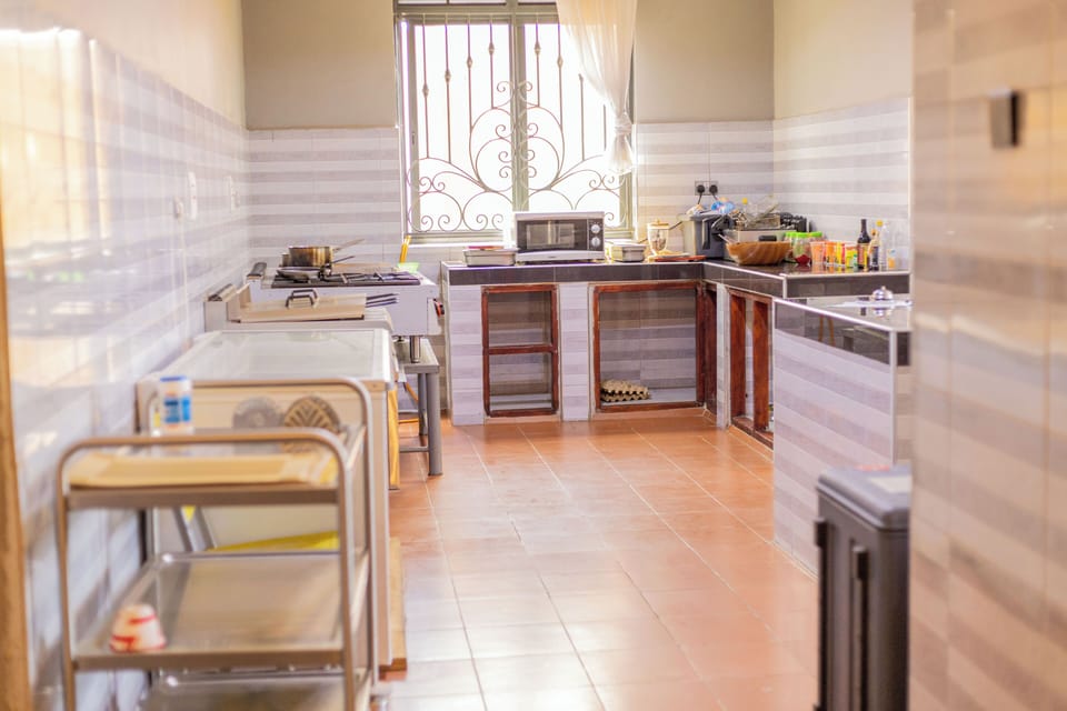 Executive Double Room | Shared kitchen facilities | Coffee/tea maker, electric kettle