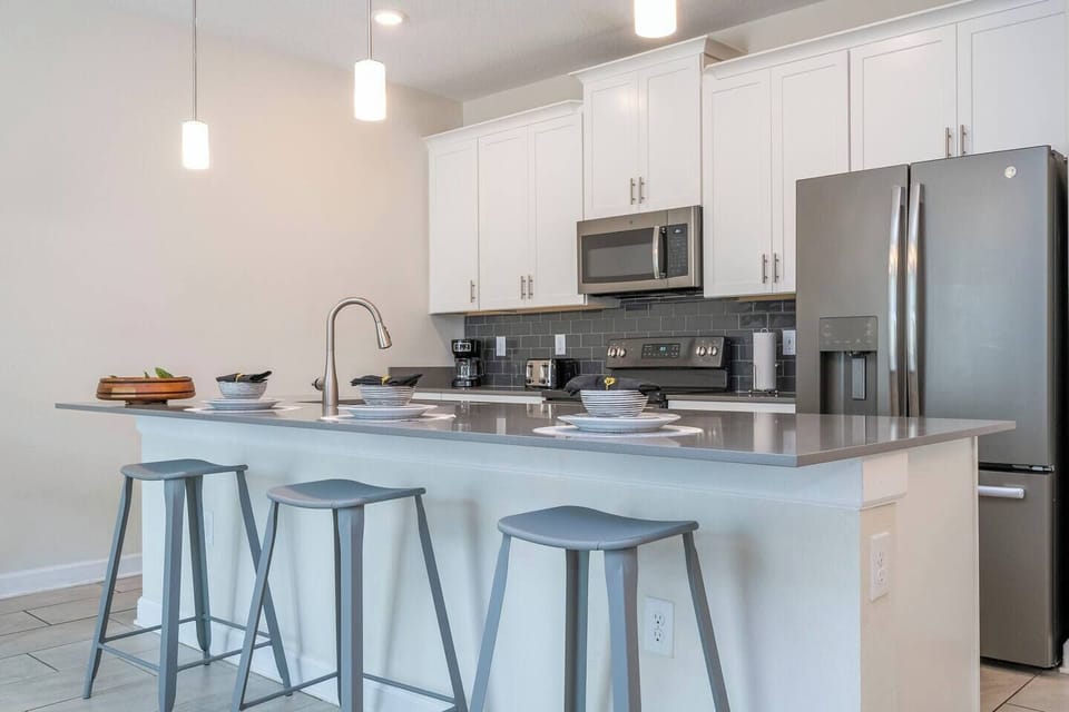 A fully equipped and comfortable kitchen ready for family gatherings where you can feel as cozy as home. Microwave, oven, dishwasher, refrigerator and stove available for you to cook.