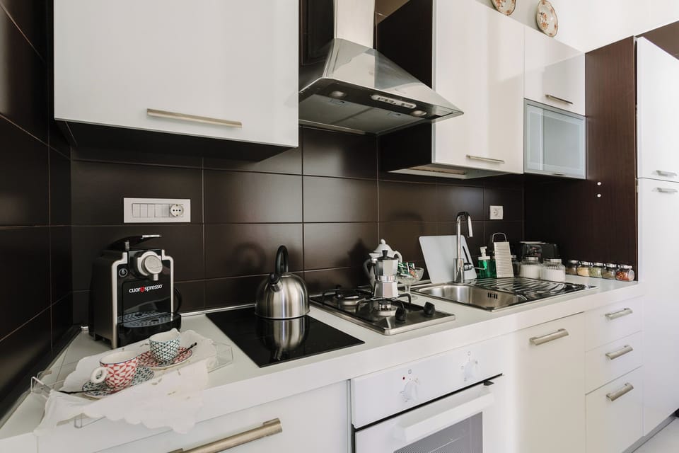 Apartment, 2 Bedrooms | Private kitchen | Fridge, stovetop, toaster, cookware/dishes/utensils