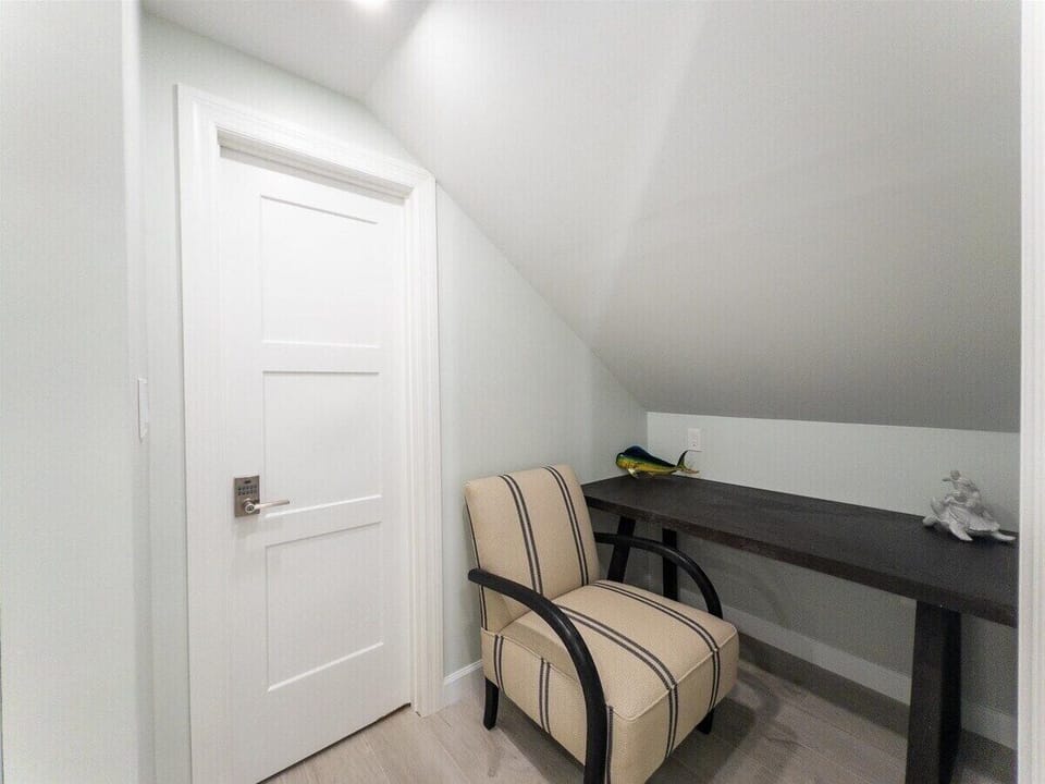 Dedicated workspace off the primary suite with a quiet and comfortable setup.