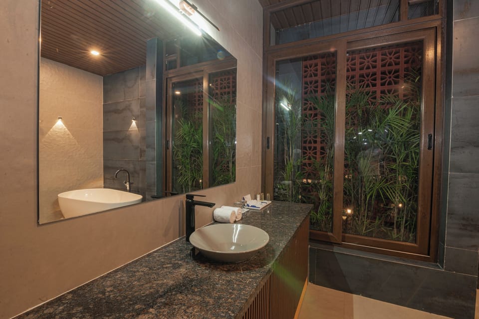 Prestigious Villa | Bathroom | Rainfall showerhead, hair dryer, slippers, towels