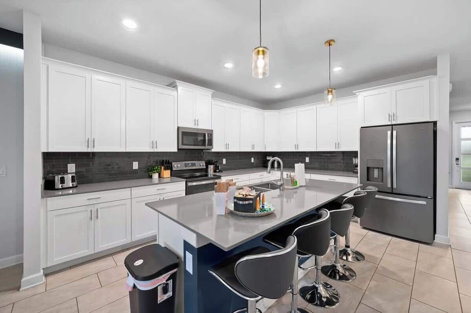 Seating for 6 at the dining room table and 5 at the kitchen island, plus 4+ on the patio just outside the sliding glass doors. Room for the whole family to be together!