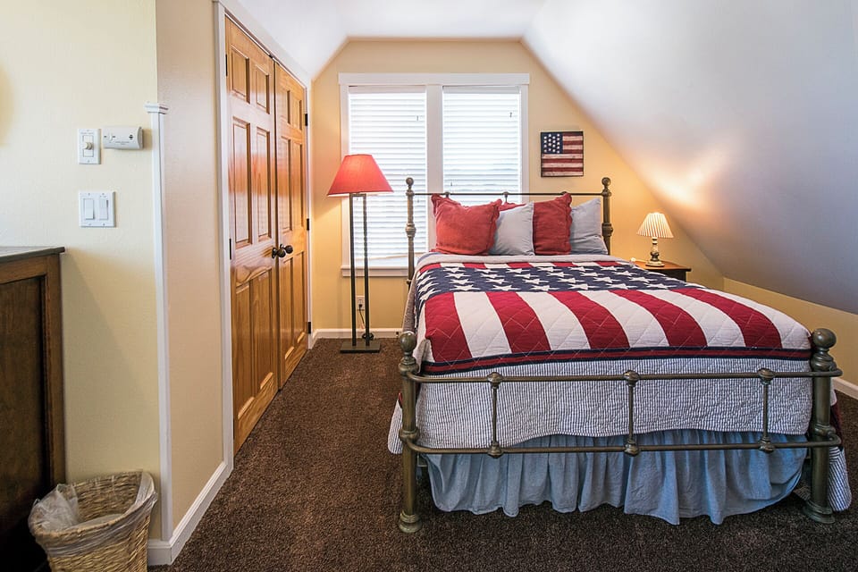 Soft, inviting quilts make the queen bedroom the perfect place to recharge after a day at the beach.