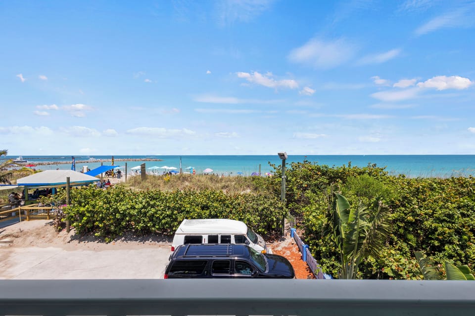 The view from the room overlooks the ocean, beach, and peaks of the Fort Pierce Inlet.