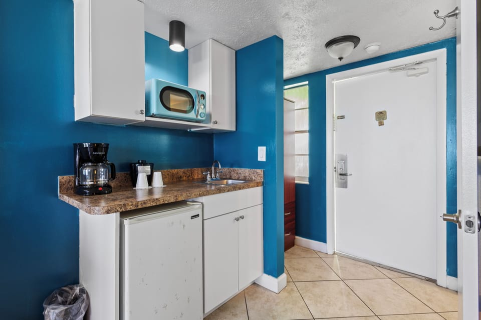 Entrance and wet bar area in room.