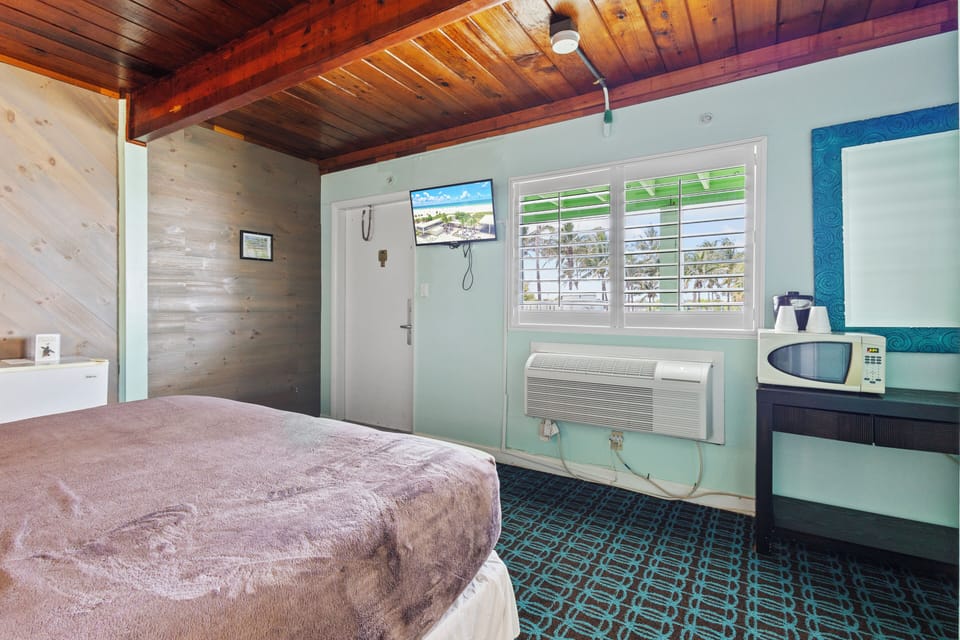 Entrance from the shared balcony with views of the inlet and ocean.