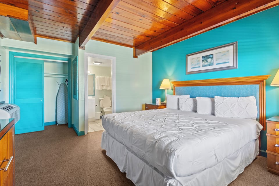 Comfortable rustic charm with wood ceilings and coastal colors and decor.
