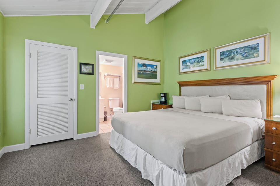 Amenities include a smart TV with cable, a mini fridge, a microwave, and a coffee maker.