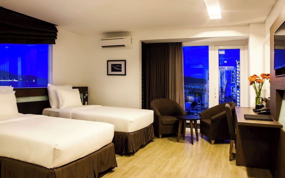 Executive Double or Twin Room, Balcony, City View | In-room safe, soundproofing, iron/ironing board, free WiFi