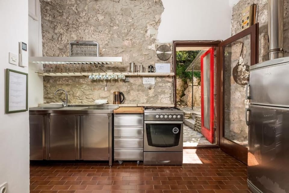 Villa, 6 Bedrooms | Private kitchen | Full-size fridge, microwave, oven, stovetop