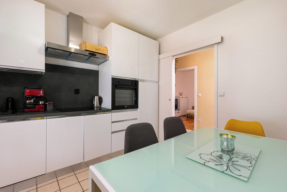 Apartment, 2 Bedrooms | Private kitchen | Full-size fridge, oven, stovetop, dishwasher