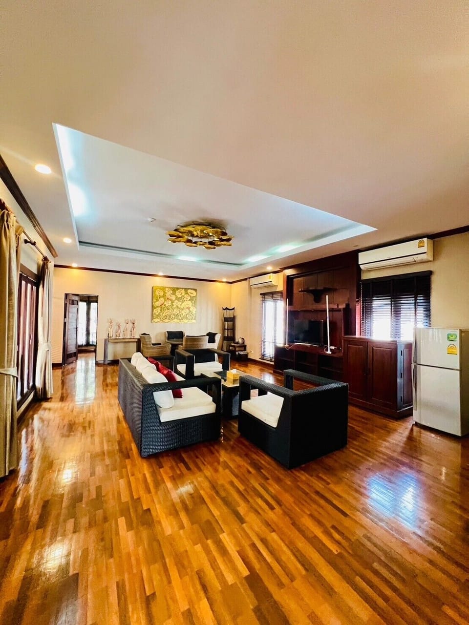 Family Suite, 2 Bedrooms | Living area | 32-inch TV with cable channels