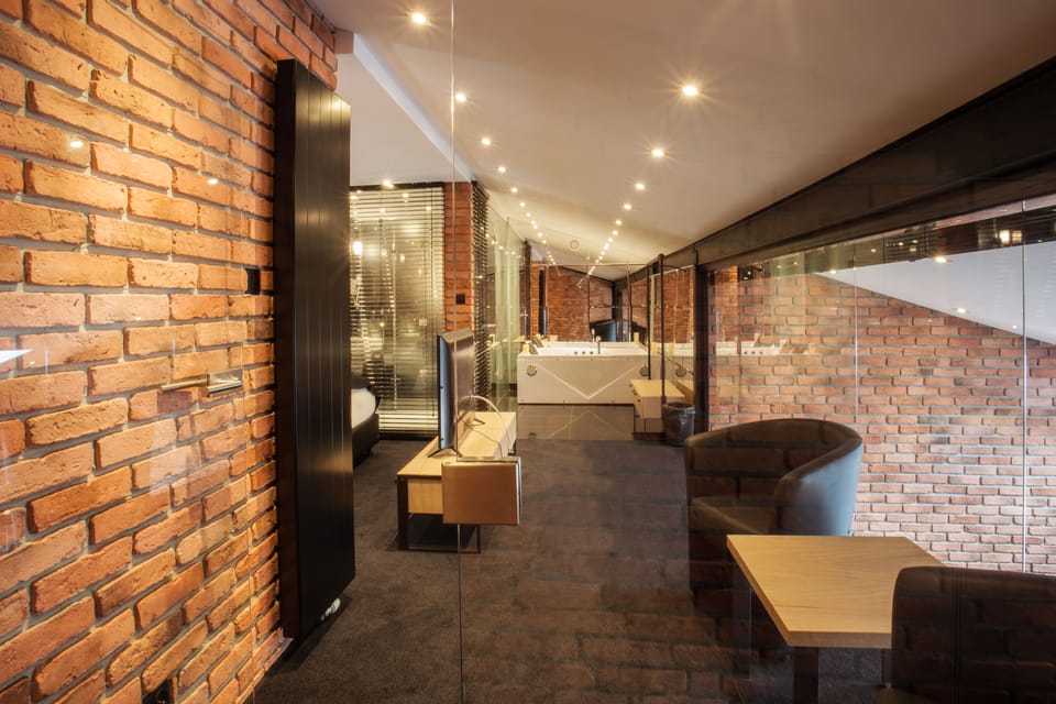 Suite, City View (Main Market Square) | Living area | Flat-screen TV