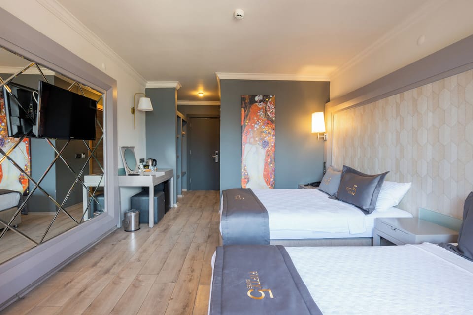Select Comfort beds, minibar, in-room safe, desk
