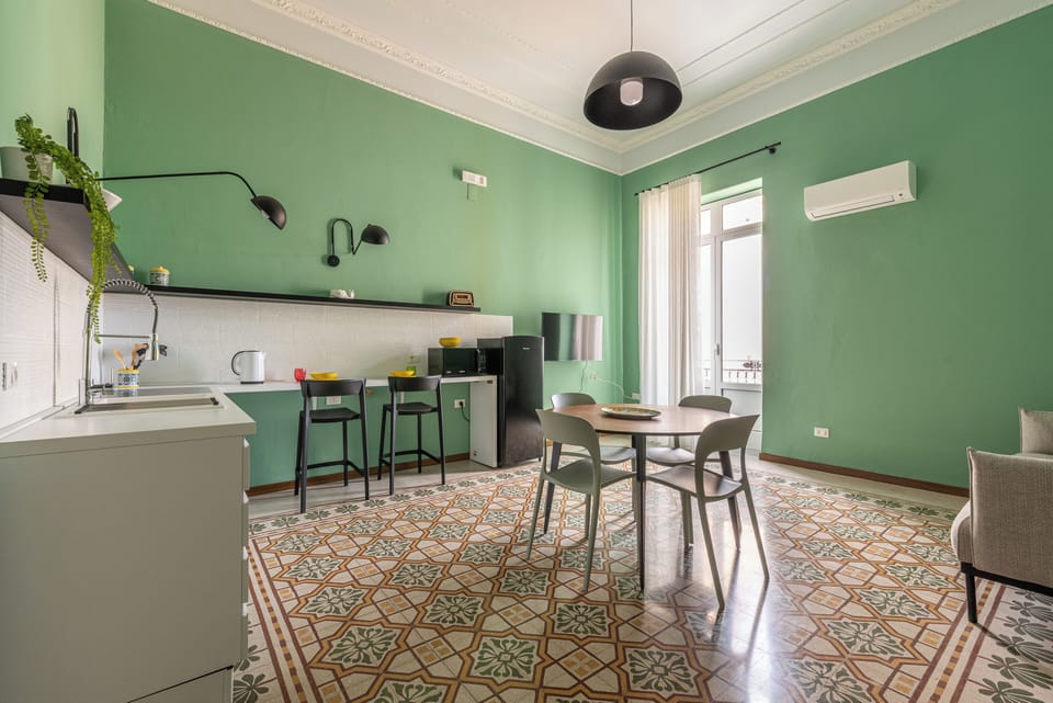 Apartment, Balcony, City View | Living area | 30-inch flat-screen TV with digital channels