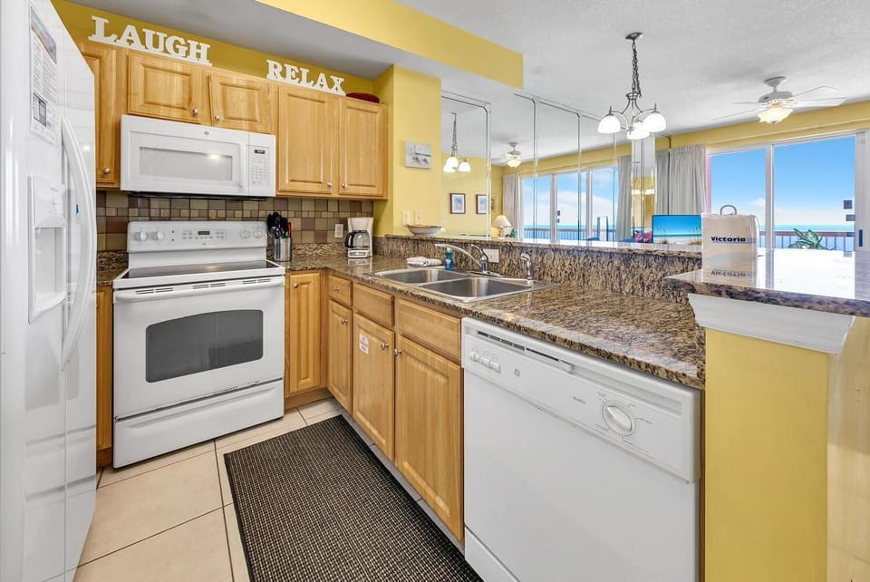 Condo, 1 King Bed with Sofa bed (Sunrise Beach 2107) | Private kitchen | Oven, toaster