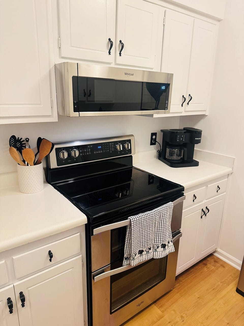 Kitchen area with coffee maker and mircowave 