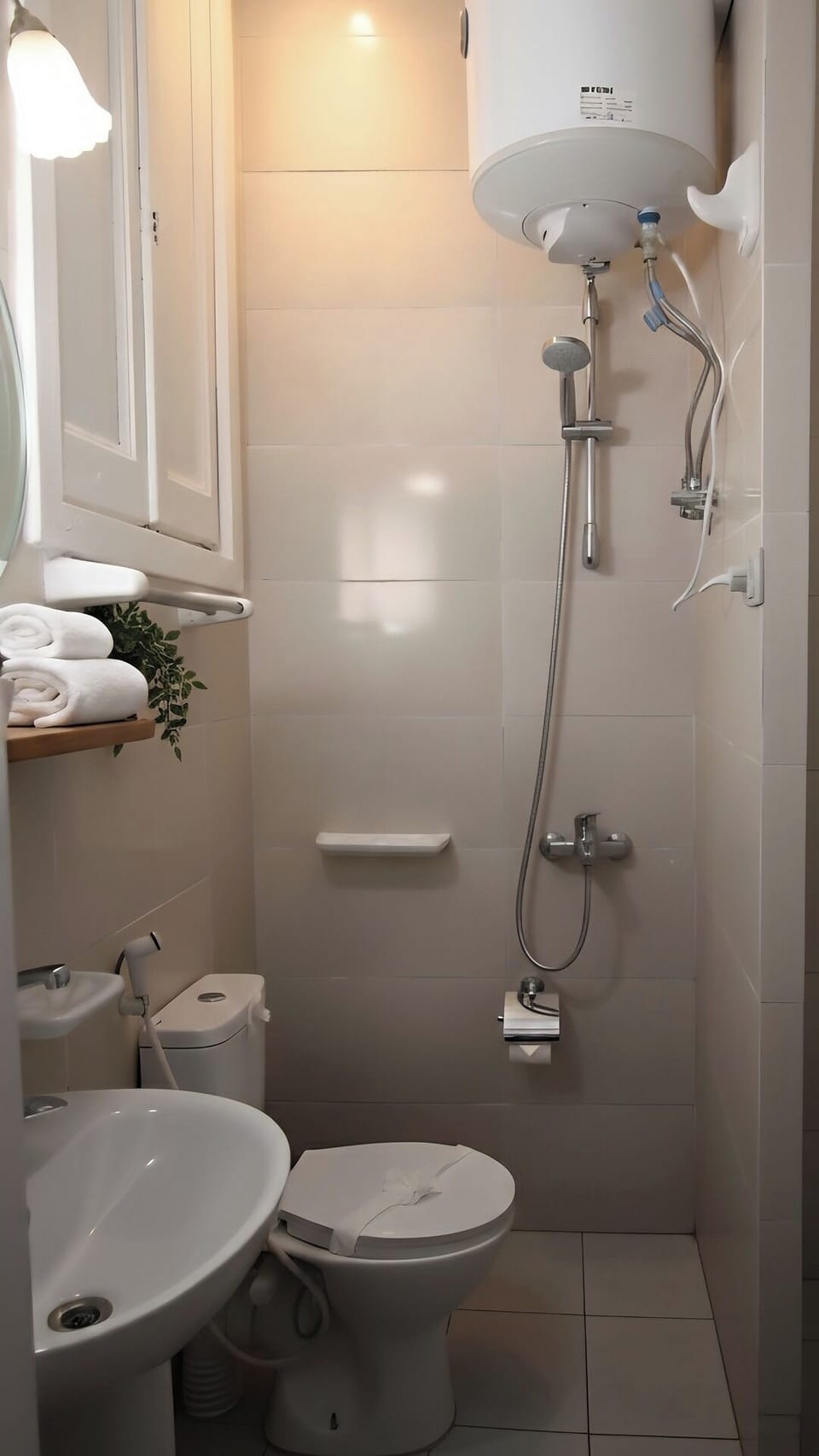 Rainfall showerhead, free toiletries, hair dryer, heated floors