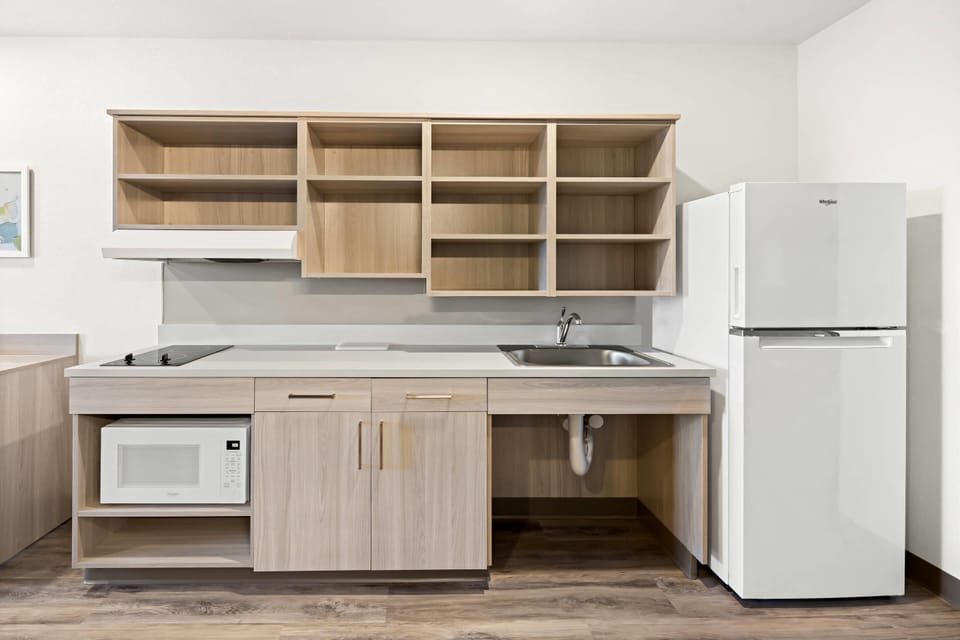 Suite, 1 King Bed, Accessible, Non Smoking | Desk, laptop workspace, WiFi (free), bed sheets