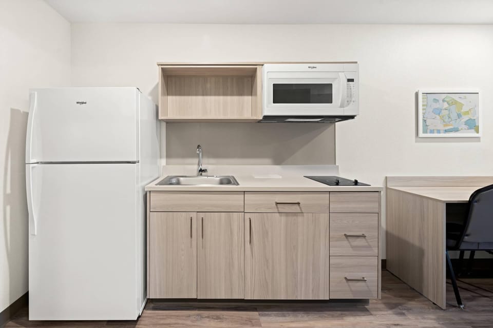 Suite, 2 Queen Beds, Non Smoking | Desk, laptop workspace, WiFi (free), bed sheets