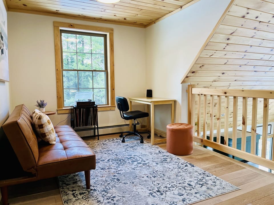Loft Lounge – Read, listen, or simply unwind in your cozy nook