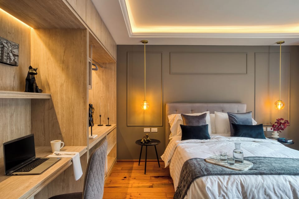 Comfort Room, Balcony | In-room safe, desk, laptop workspace, blackout drapes
