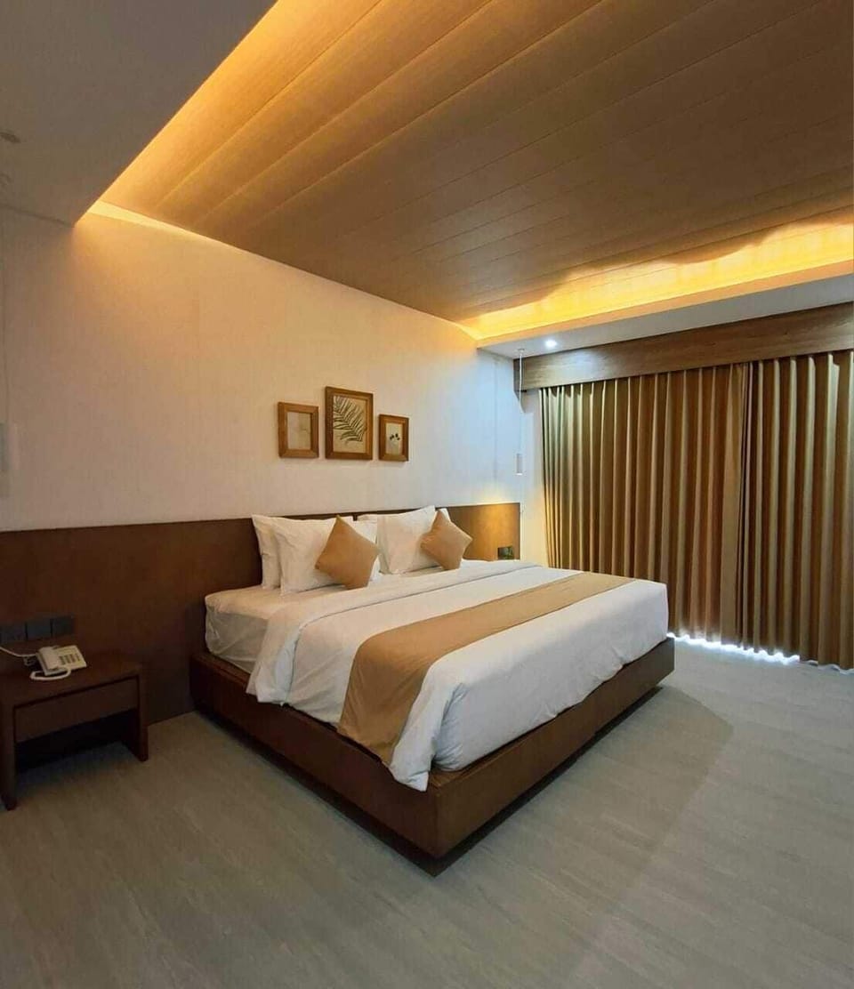 Deluxe Double or Twin Room, Balcony, Pool View | In-room safe, laptop workspace, blackout drapes, soundproofing