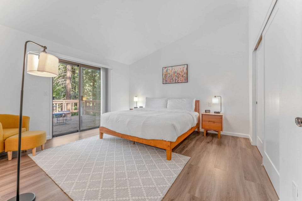 Bedroom 1: Master suite,  King bed, closet, chair and ottoman, en suite bath, private balcony, upper floor