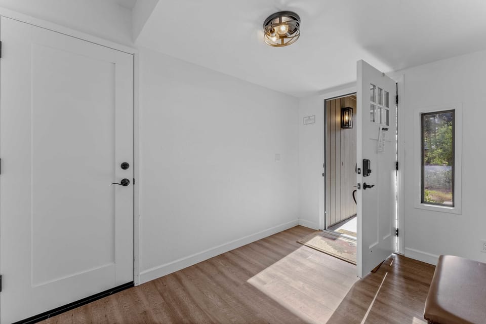 Entryway: Front door entryway, bench, lower floor