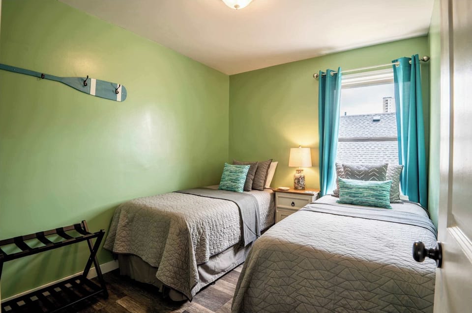 Condo, Multiple Beds, Balcony, Partial Ocean View (SandShells Retreat) | 2 bedrooms, individually decorated, individually furnished, bed sheets