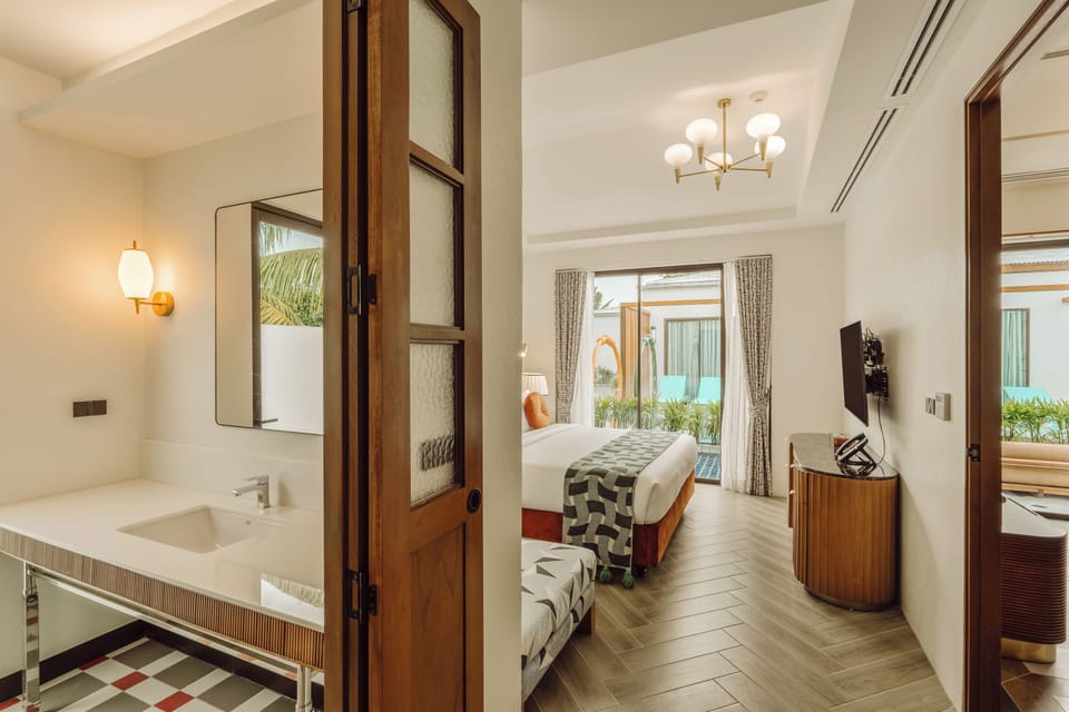 Two-bedroom Lagoon Suite Villa (Up to 4 Guests) (Free Drop-off Airport Transfer) | In-room safe, laptop workspace, blackout drapes, iron/ironing board