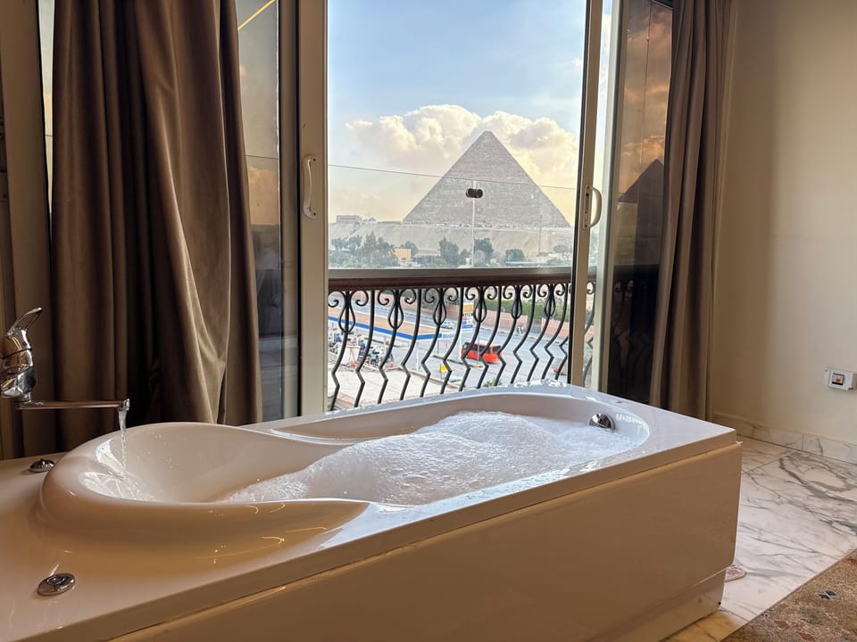 Junior Room, 1 King Bed | Minibar, in-room safe, soundproofing, iron/ironing board