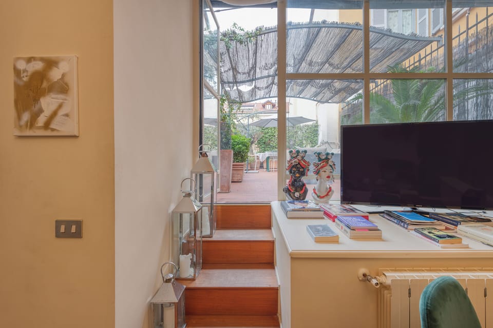 Superior Apartment | Living area | Flat-screen TV