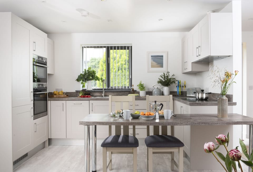 The Wood Shed, Perranporth. The sleek, contemporary kitchen is well-quipped with everything you'll need during your stay.