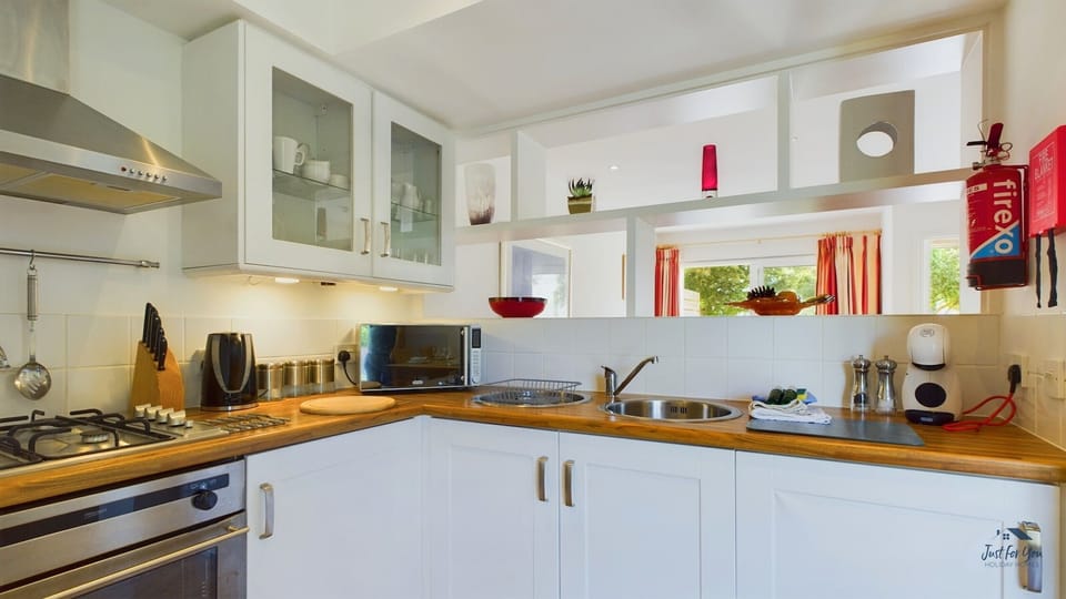 Enjoy home comforts with an coffee machine, microwave, and all the utensils needed for your stay.
