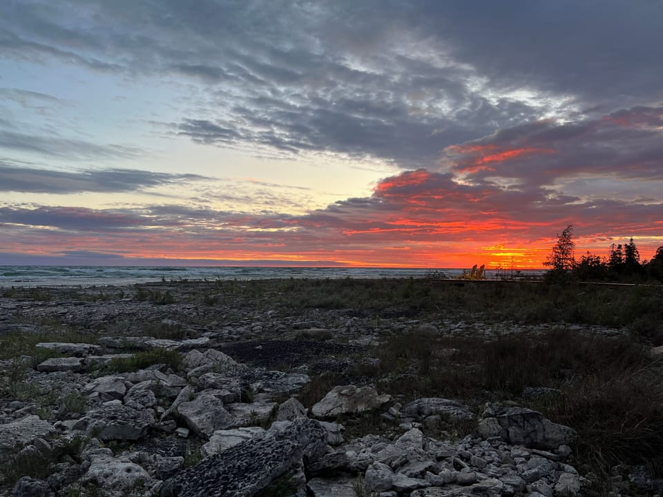 End your day with a breathtaking show—fiery skies meet rugged shoreline for unforgettable sunset views right at your doorstep.