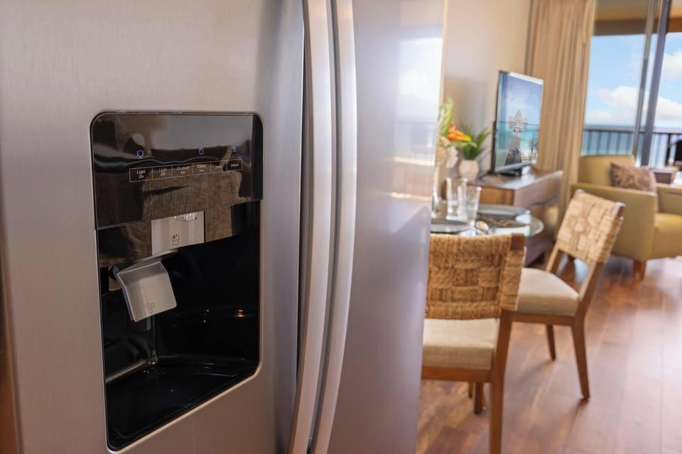 Stay refreshed with the built-in ice maker, perfect for chilled drinks while enjoying your tropical getaway.
