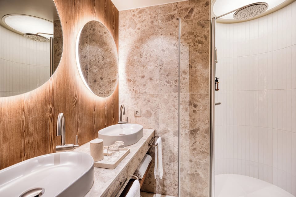 Junior Suite, 1 King Bed | Bathroom | Separate tub and shower, rainfall showerhead, eco-friendly toiletries