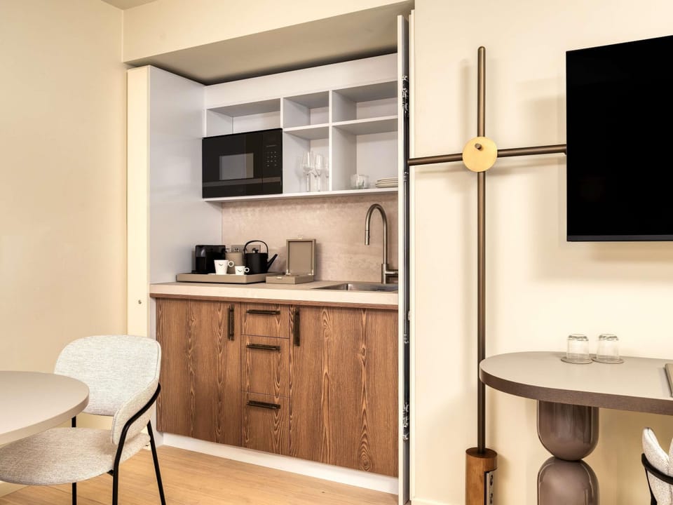 Junior Suite, 1 King Bed | Premium bedding, minibar, in-room safe, individually decorated