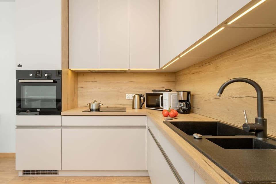 The kitchenette's practical layout maximizes space and functionality.