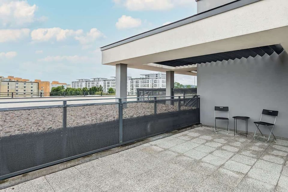 The balcony's peaceful ambiance is ideal for unwinding. 