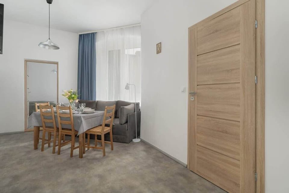 Living room with dining table and chairs.