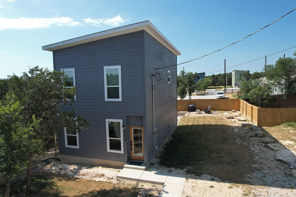 Exterior of the home as seen from the parking area.