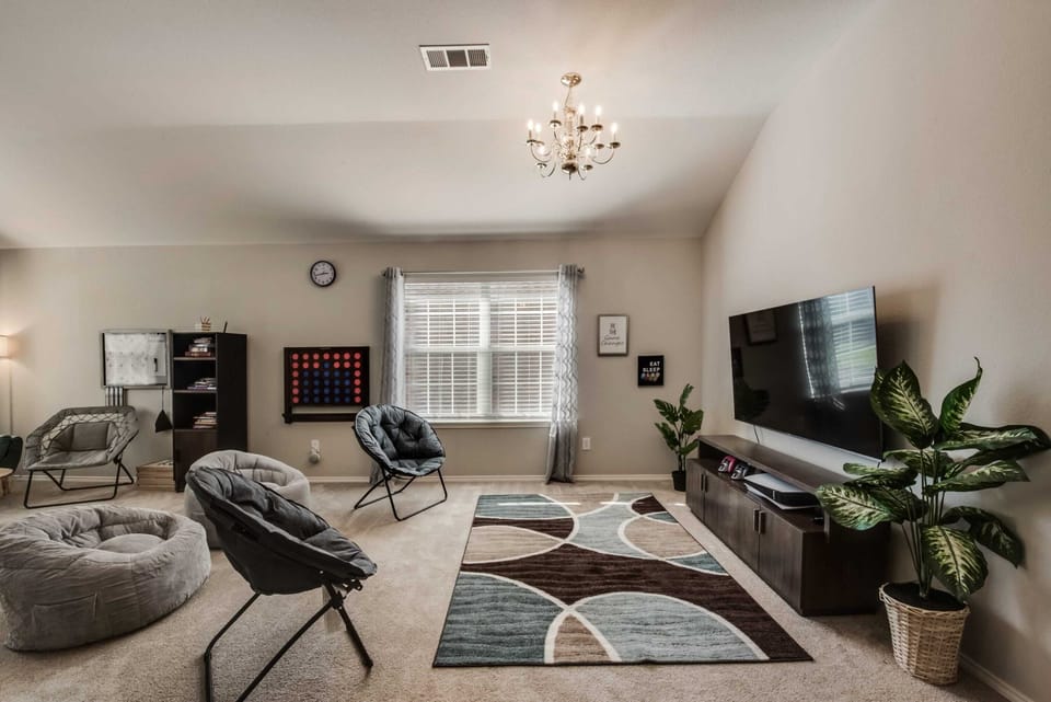 Try your hand at this oversized game of Connect Four, fire up your brain for a round of Scrabble, or select your favorite boardgame to delve into in this delightful game room!
