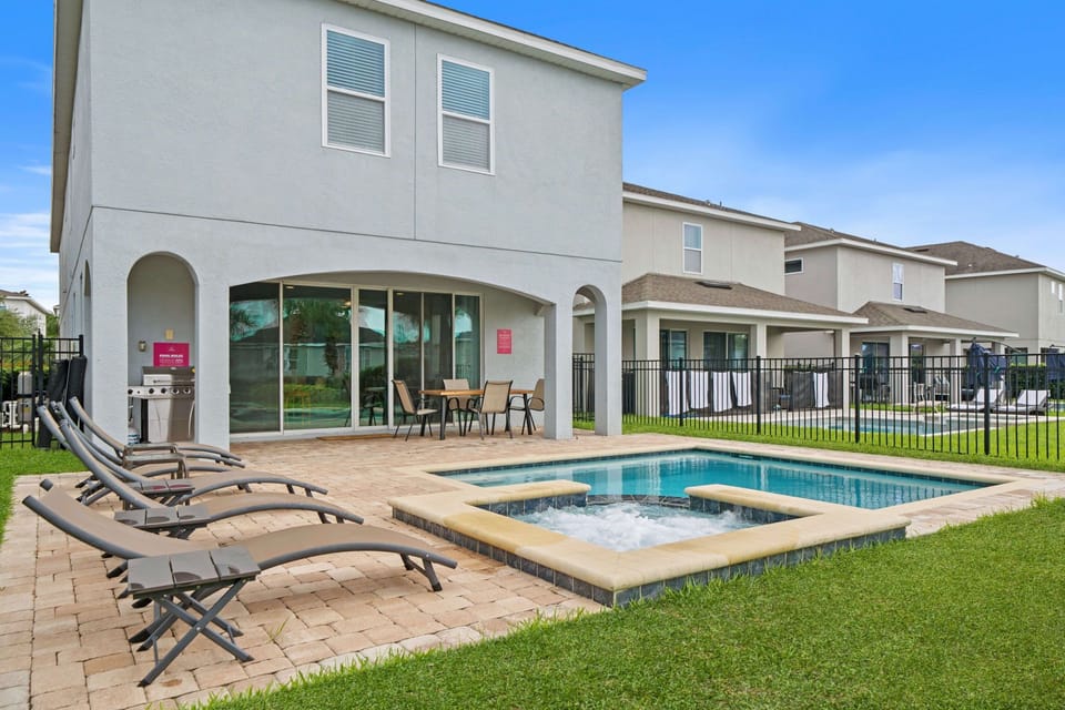 Beat the heat in style at inviting private pool of the home in Kissimmee Florida - Immerse yourself in the cool elegance of pool with plenty of comfortable seating - Soak up the ambiance with a dip in our stunning pool