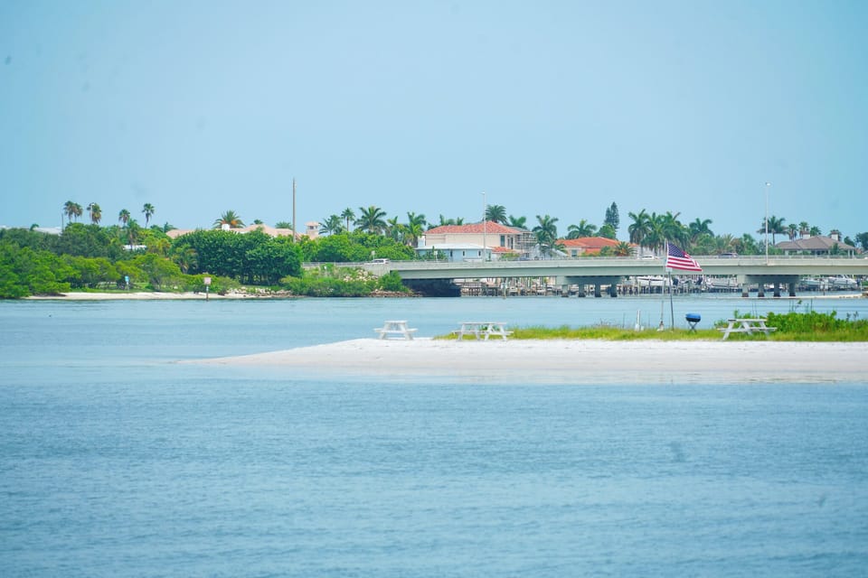 The secluded island off the dock beckons guest to test their paddle board skills.