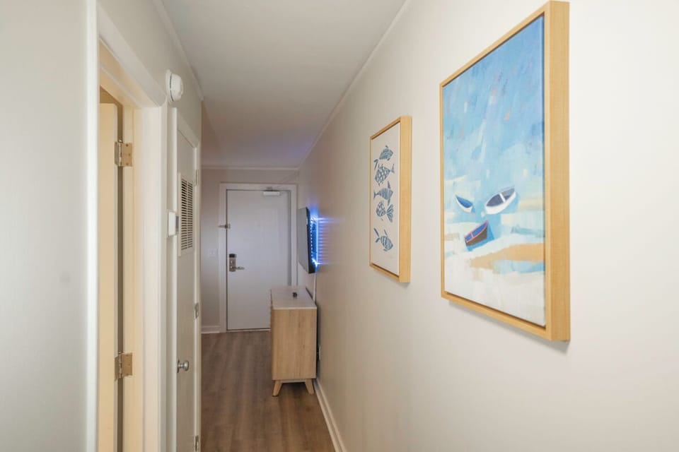 The living area is connected to the bedroom by a hallway