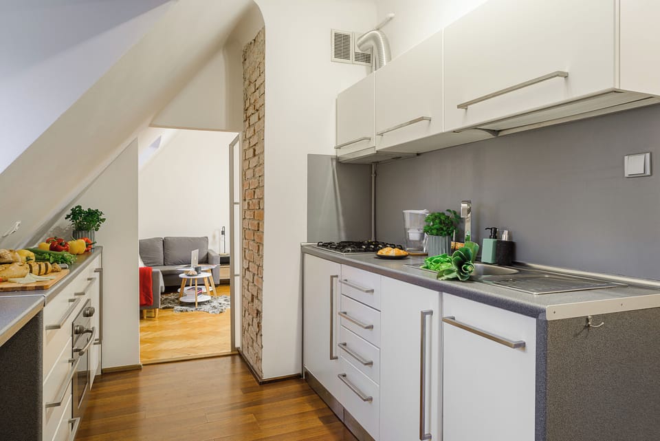 Comfort Apartment | Private kitchen | Full-size fridge, microwave, oven, stovetop