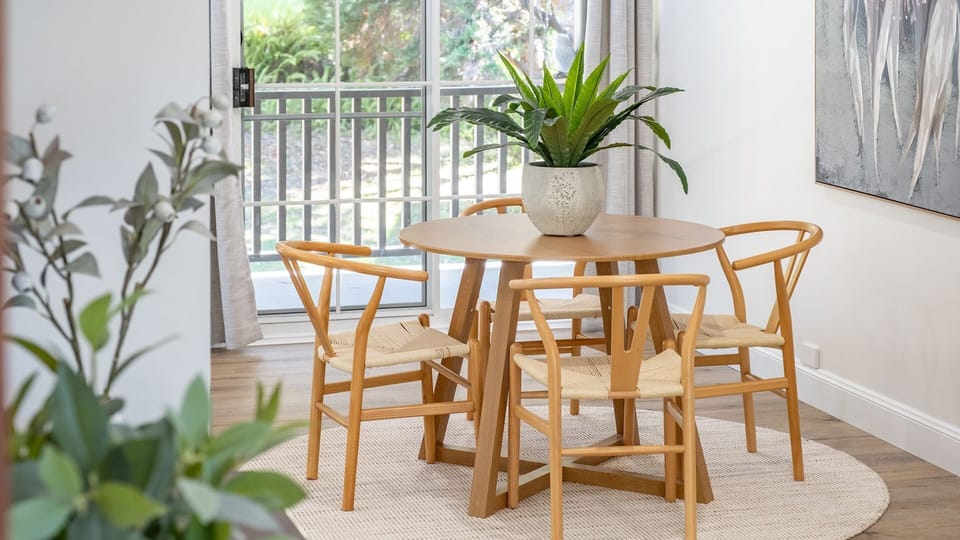 Dining Area with Round Wooden Table